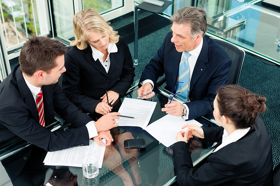 bigstock-Business-meeting-in-an-offic-17741171